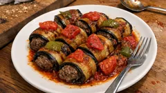 Fırında salçalı sosla patlıcan sarma: köftesi sulu kalan tam kıvam tarif