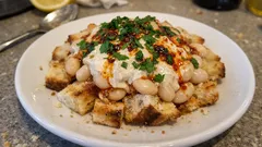 Vardabit Paçası tarifi: kuru fasulye, kıtır pide ve limonlu tahin sosuyla tek tabakta doyurucu lezzet