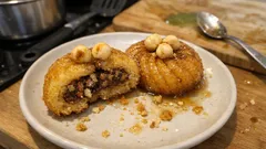 Çarkıfelek Tatlısı tarifi: İrmikli hamur, ceviz dolgu ve soğuk şerbetle tam kıvamında