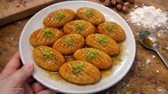 Fırında kızarıp şerbeti tam çeken fındıkpare tarifi: tatlı sıcakken, şerbet soğukken